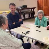 Warwick’s Activitea group is looking for new members for socialising and activities such as dominos. Photo supplied