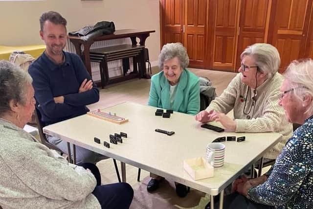 Warwick’s Activitea group is looking for new members for socialising and activities such as dominos. Photo supplied