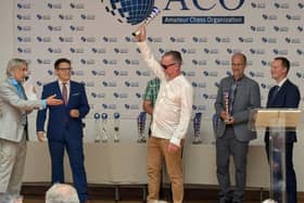 Jason Madden shows off his world trophy in Crete