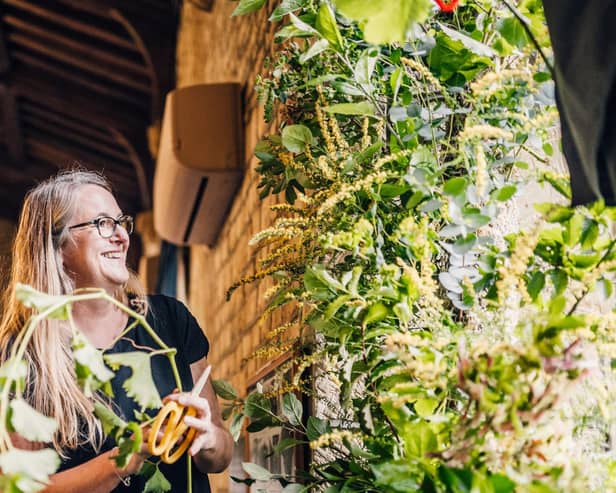 Nicola Hill of Gentle Blooms creating a floral  installation. Credit: Alice Morgan Photography