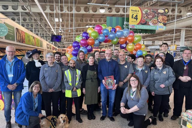Morrisons Colleagues with the High Sheriff of Warwickshire Sophie Hillereay and Mayor of Leamington Cllr Nick Wilkins, Tony Burford, Commonwealth Games gold medallist Lewis Williams and members of the Guide Dogs and Guide Dog Ambassador Sky. Photo supplied