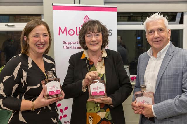 Rachel Ollerenshaw of Molly Ollys, Kate Rolfe the Deputy Mayor of Stratford and Tim Ollerenshaw (Rachel's husband) at the launch of the charity's gin. Picture supplied.