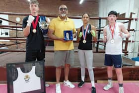 Leamington Community Boxing coach Babs Kandola with boxers Albert England, Priya Virk and Jack Ryan. Picture supplied.