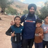 Bill Mato with young survivors of the earthquake in Morocco. Picture supplied.