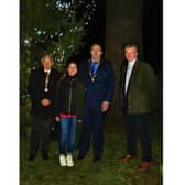 Royal Leamington Spa Rotary Club President David Leigh-Hunt, Myton Hospices fundraiser Laura Haswell, Whitnash Mayor Cllr Barry Franklin, and Rev Steve Davies after the switch-on of the Whitnash Tree of Light outside St Margaret's church.  Picture supplied