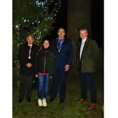Royal Leamington Spa Rotary Club President David Leigh-Hunt, Myton Hospices fundraiser Laura Haswell, Whitnash Mayor Cllr Barry Franklin, and Rev Steve Davies after the switch-on of the Whitnash Tree of Light outside St Margaret's church.  Picture supplied