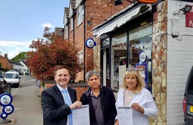 Alberto Costa with former postmaster Nav Vara and Cllr Rosita Page outside the Ullesthorpe post office in 2019.