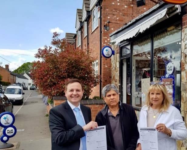 Alberto Costa with former postmaster Nav Vara and Cllr Rosita Page outside the Ullesthorpe post office in 2019.