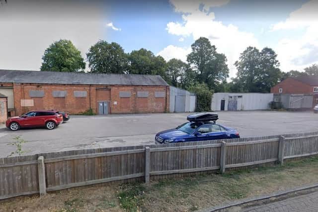 The view from Caldecott Place of the current gym club car park that is being lined up for possible flats, with the club on the move to Kilsby Lane. Photo: Google Street View.
