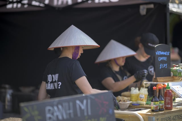 Staff from Banh Mi Caphe serving Vietnamese delights.
