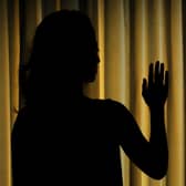 PICTURE POSED BY MODEL. A woman showing signs of depression.