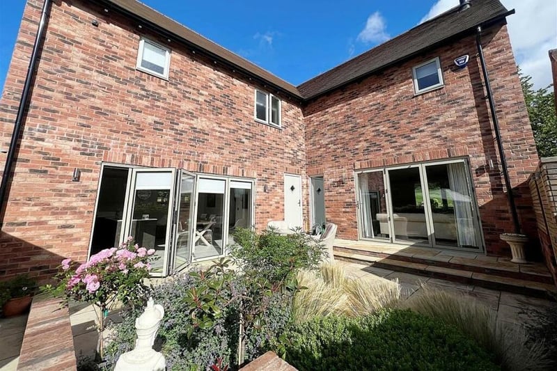 The rear of the house and garden area. Photo by Julie Philpot