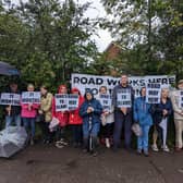 Protesters gathered in the rain to make their voices heard over plans for year-long roadworks near Hatton Park.
