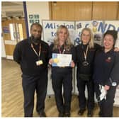 The Warwickshire Fire and Rescue Service 's Hospital to Home team received a ‘Gold Medal Award’ from the Emergency Care Improvement Support Team, NHS England. Photo supplied