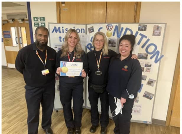 The Warwickshire Fire and Rescue Service 's Hospital to Home team received a ‘Gold Medal Award’ from the Emergency Care Improvement Support Team, NHS England. Photo supplied