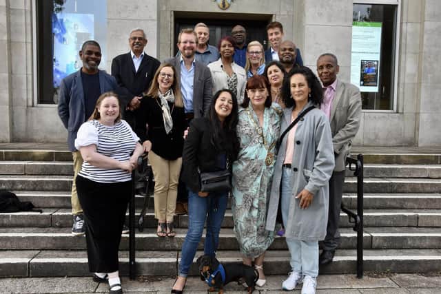Those attending the reception at the Mayor's Parlour on Friday, gathered on the town hall steps before starting their discussions about a memorial.