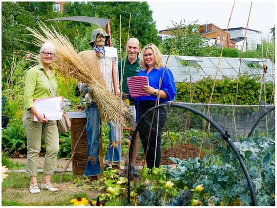 Maggie Field, Kenilworth Town Clerk with Chris Coton Chairman of the Kenilworth Allotment Tenant’s Association and Ann Barry a committee member of the Kenilworth Allotment Tenant’s Association at the Odibourne Allotments site. Photo by Mike Baker