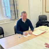 John Slinger MP holding an advice surgery.