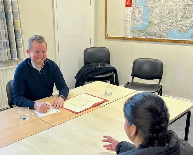 John Slinger MP holding an advice surgery.