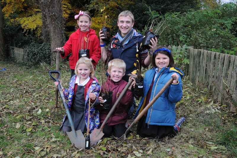 Trees were planted as a belated part of the Queen's Jubilee celebrations at Emscote Infant School in Warwick. A Royal Oak was being planted along with 59 other saplings of various varieties and seen about to plant some of them are pupils Lily 6, Amber 6, Mason 6 and Sophia 6 along with Teaching Assistant Ryan Collier.