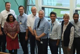 Professor Sir Stephen Powis (sixth from left) during the visit to University Hospital, Coventry