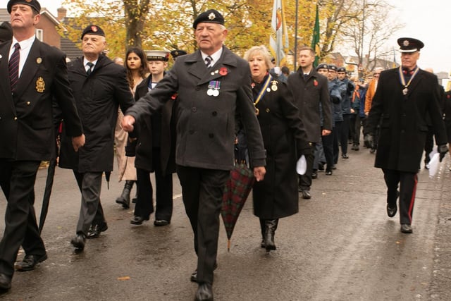 Marching in the parade.