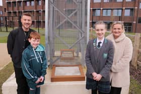 Free Radio Breakfast Show hosts JD and Roisin unveil their Hollywood-style handprints at Houlton School, with Jacob (aged 11) and Maizie (aged 12).