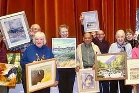 Artists show off their work.