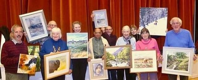 Artists show off their work.