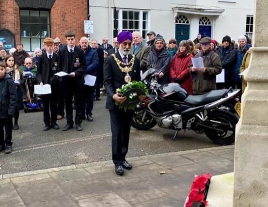 The community in Warwick will once again be marking Holocaust Memorial Day this month. Photo shos Warwick Mayor for 2022/23 Cllr Parminder Singh Birdi laying a wreath at the war memorial during the remembrance service in 2023. Photo by Rick Thompson