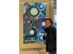 Katie Jones with her artwork on display at the DEMO (Design in Motion) Festival. Picture supplied.