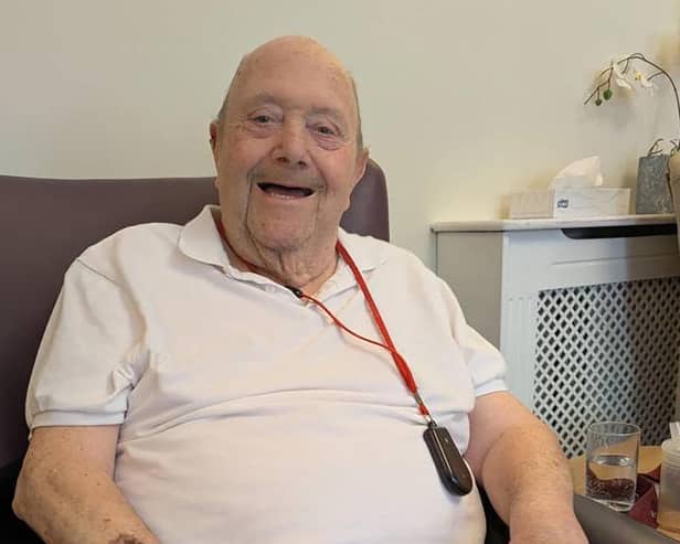 Resident at HC-One’s Victoria Park Care Home planting sunflowers