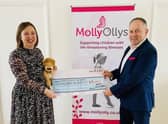 Co-founder of Molly Ollys, Rachel Ollerenshaw being awarded the grant by Michael Bibb who has been a member of the MDRT for many years. Photo supplied