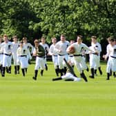 A shot from a previous recreation of the landmark 1823 game. Photo: Rugby School.
