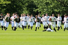 A shot from a previous recreation of the landmark 1823 game. Photo: Rugby School.