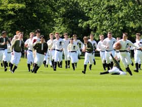 A shot from a previous recreation of the landmark 1823 game. Photo: Rugby School.