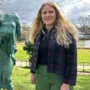 Councillor Ella Billiald alongside the Bridgeman sculpture. Credit: Warwick District Council