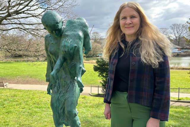 Councillor Ella Billiald alongside the Bridgeman sculpture. Credit: Warwick District Council