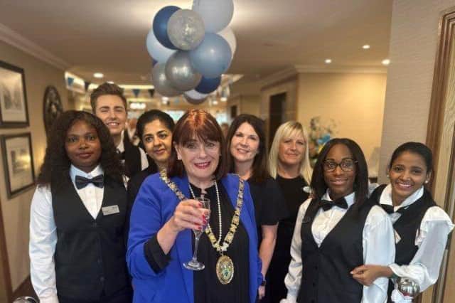 Maggie O'Rourke with staff at the new care home.