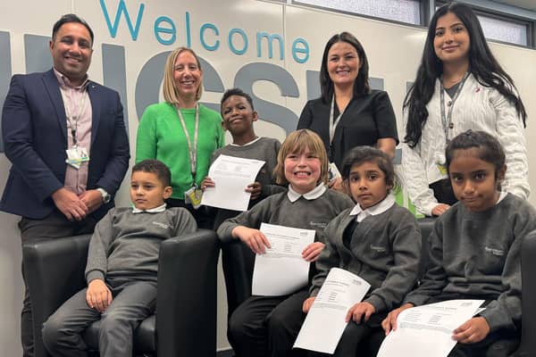 Kingsbury Academy headteacher Amjid Zaman with Clair Nutt, Christina McLaughlin, Aroosa Parveen and pupils