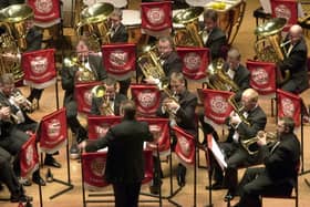 A member of the audience watches as the Grimethorpe Colliery Band perform at the Yorkshire Regional Championships part of the National Brass Band Championships of Great Britain at St George's Hall in Bradford.