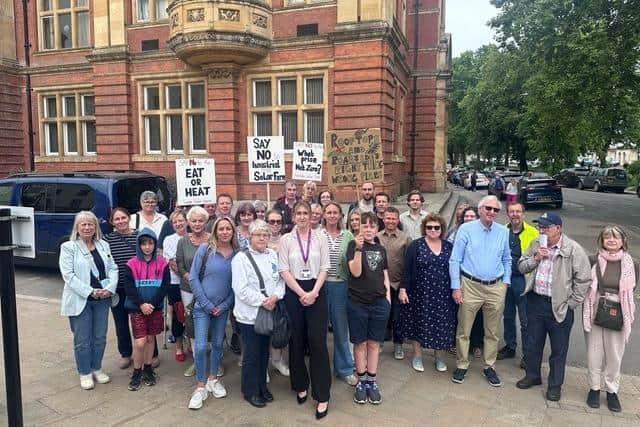 Objectors to the solar farm plans stand outside Leamington Town Hall before the planning meeting. Among them is Warwick District Councillor Rebecca Davidson (Green, Radford Semele)  who was one who spoke at the meeting. The district council's planning committee voted to reject the plans by a majority of 8/1. Picture supplied.