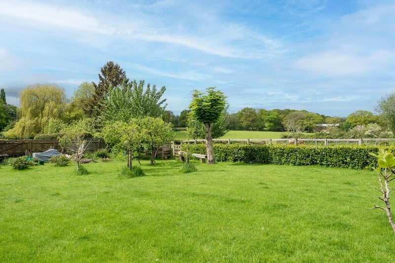 The property comes with almost an acre of land with a paddock