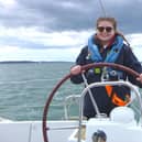 Libby at the helm.