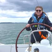 Libby at the helm.