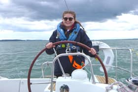 Libby at the helm.