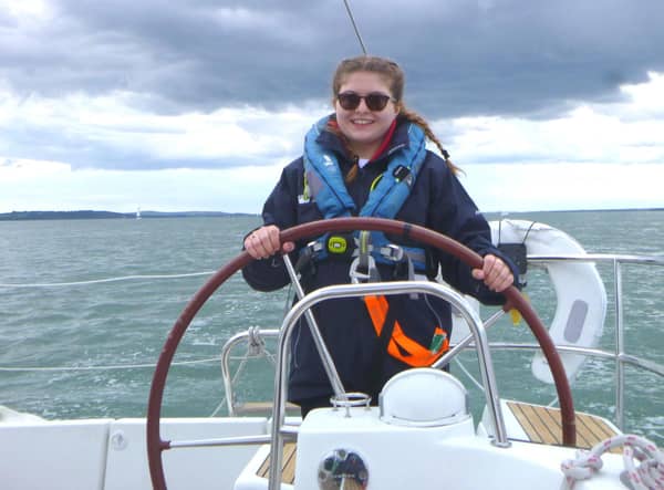 Libby at the helm.