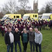 Residents and children from Hampton Lucy School waved off the Ambulance Aid team who are taking two former NHS ambulances to Poland to help those in need
