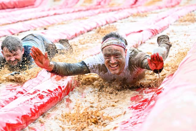 Phil Hibble on the waterslide (photo by Peachsnaps)