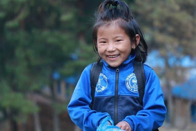 One of the children helped by New Futures Nepal who raised money for warm school uniform in the Everest region. Picture supplied.